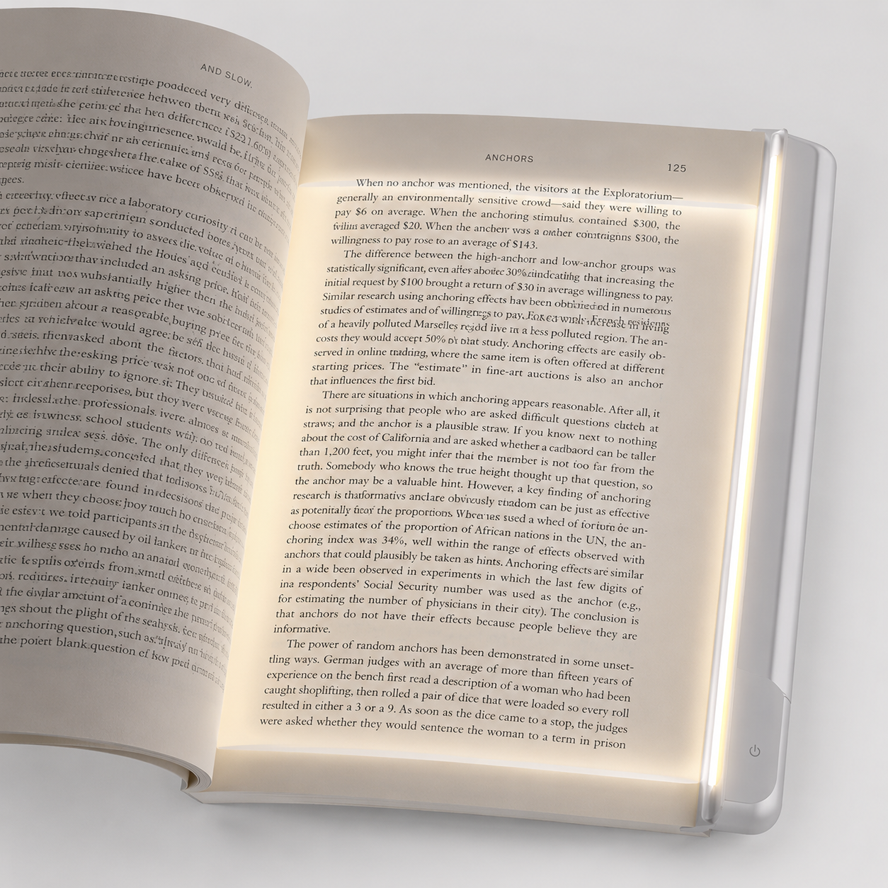 LumiPage on open book with soft amber light